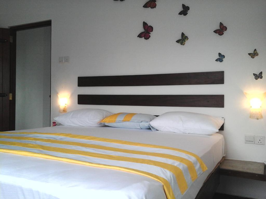 Petit Guest House Negombo Pokoj fotografie